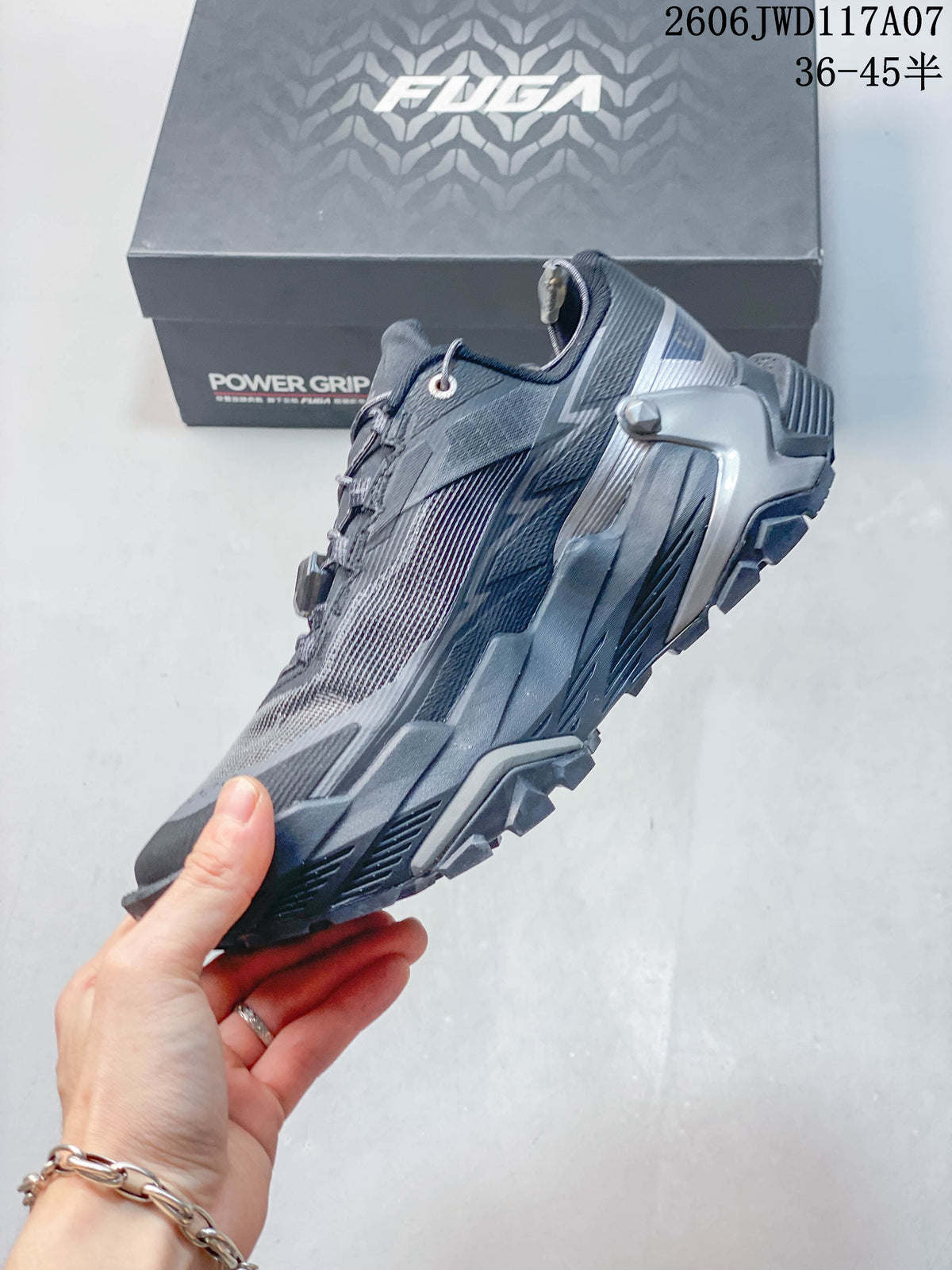 Side view of a gray Kailas trail running shoe with a rugged outsole