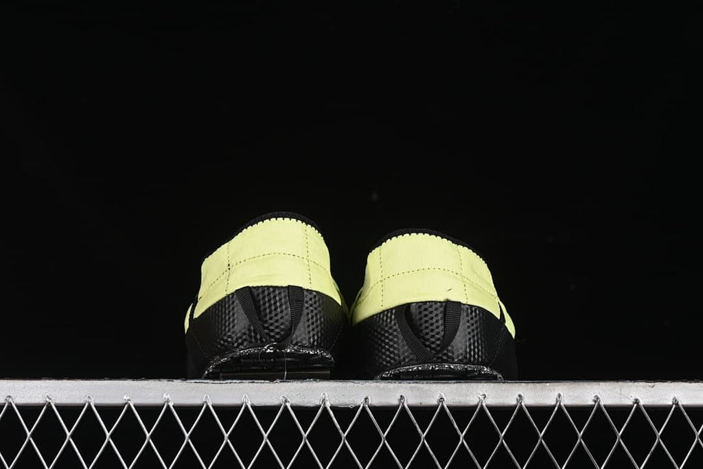 Rear view of the pair showing the heel panels and outsole details.