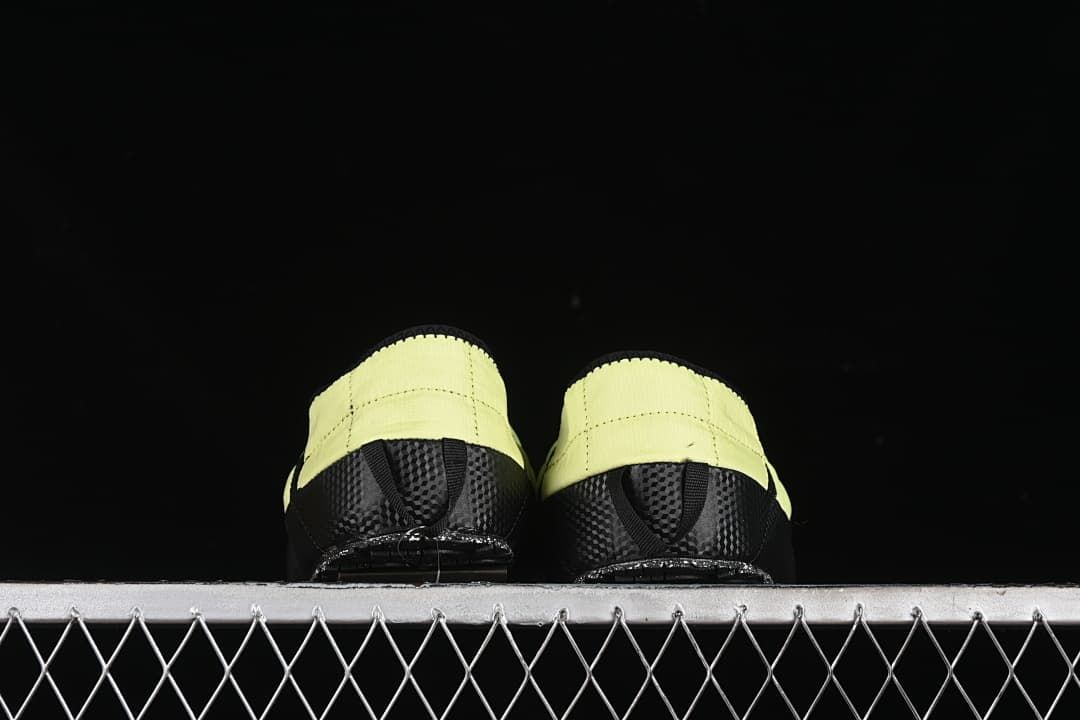Rear view of the pair showing the heel panels and outsole details.