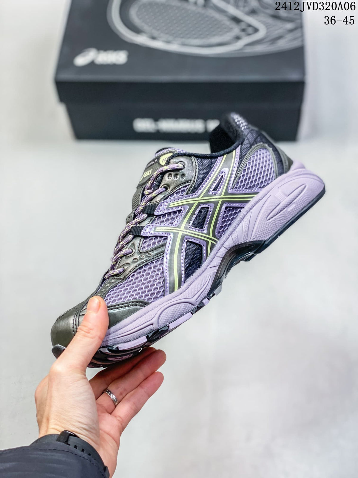 Side view of the purple and charcoal ASICS Gel-Nimbus 10.1 sneaker