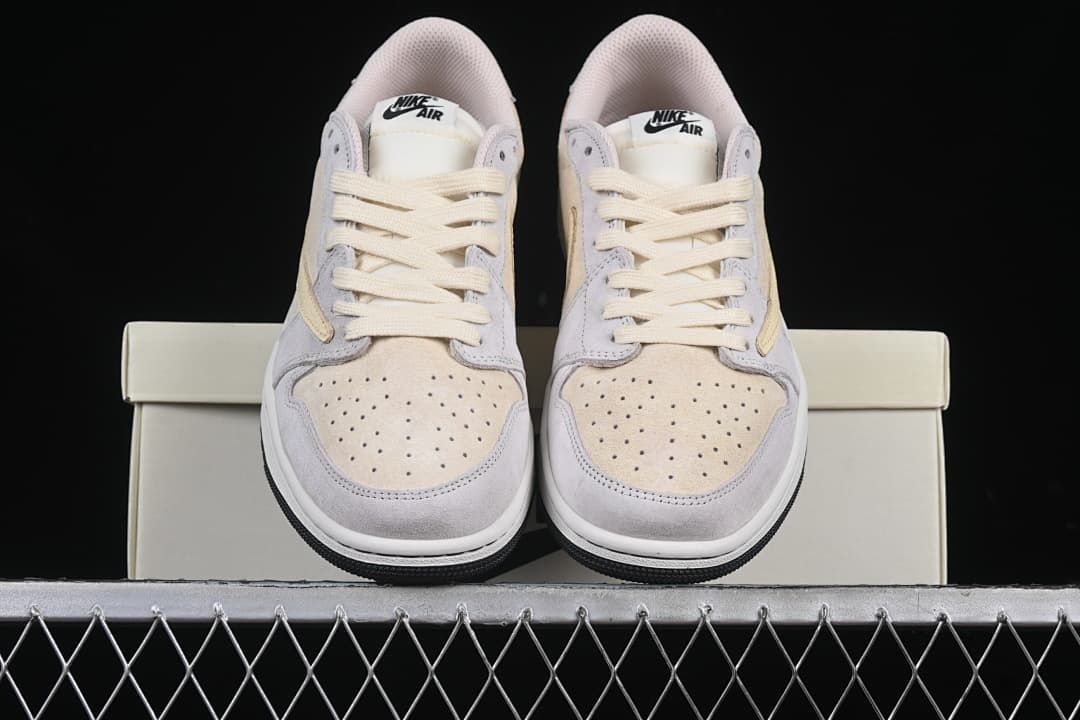 Front view of both sneakers resting on the box