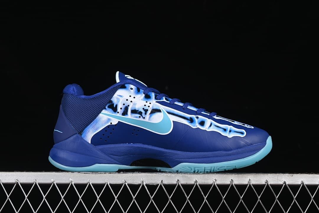 Side profile showing the skeletal graphic, Swoosh, and outsole