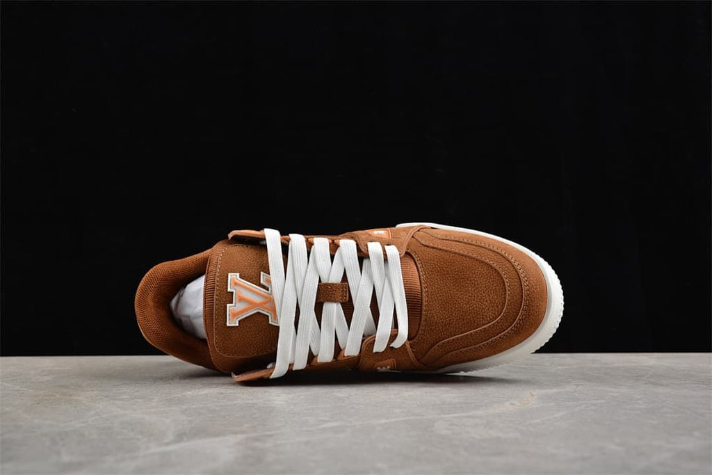 Top view of a brown LV Trainer sneaker with white laces