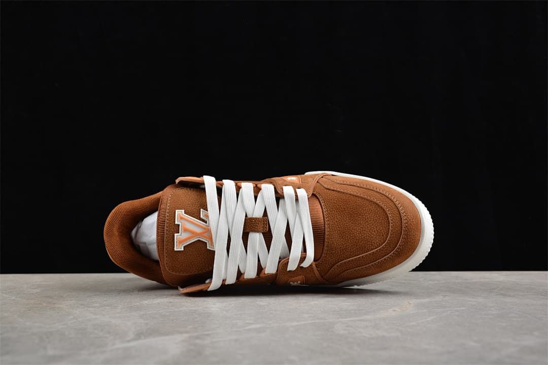 Top view of a brown LV Trainer sneaker with white laces