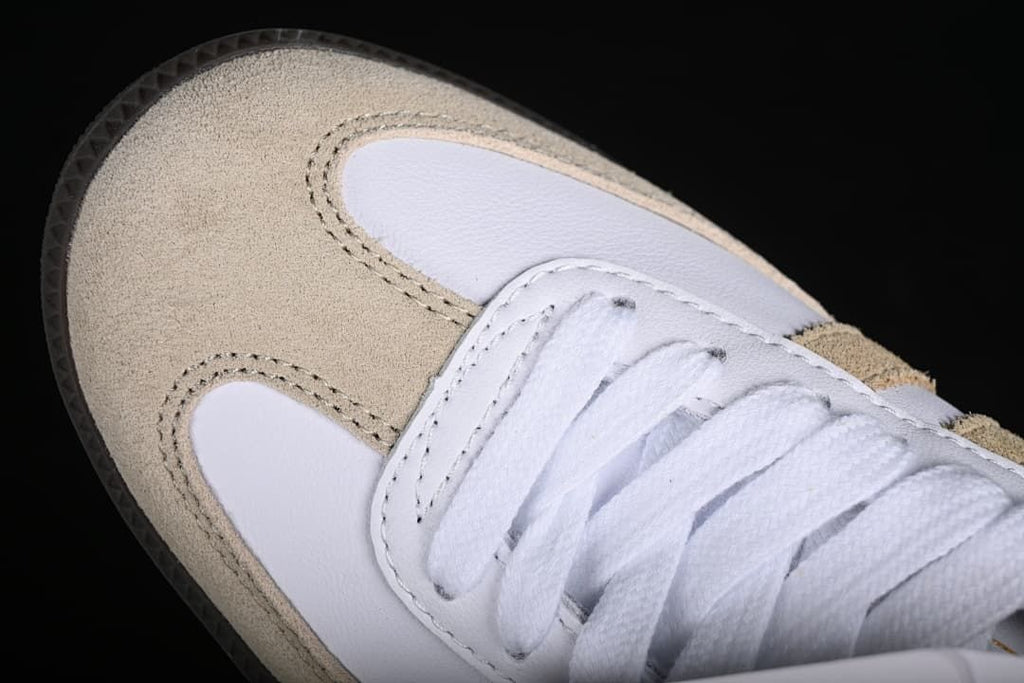 Close-up of the white and beige toe area and laces