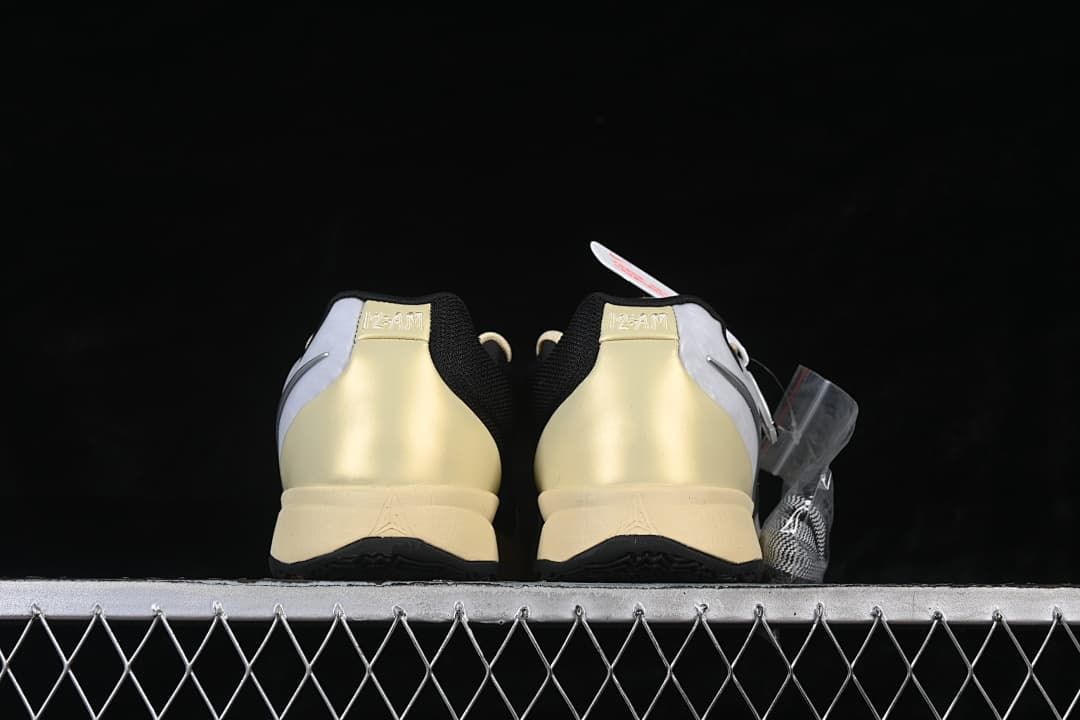 Rear view of both shoes showing their heel panels