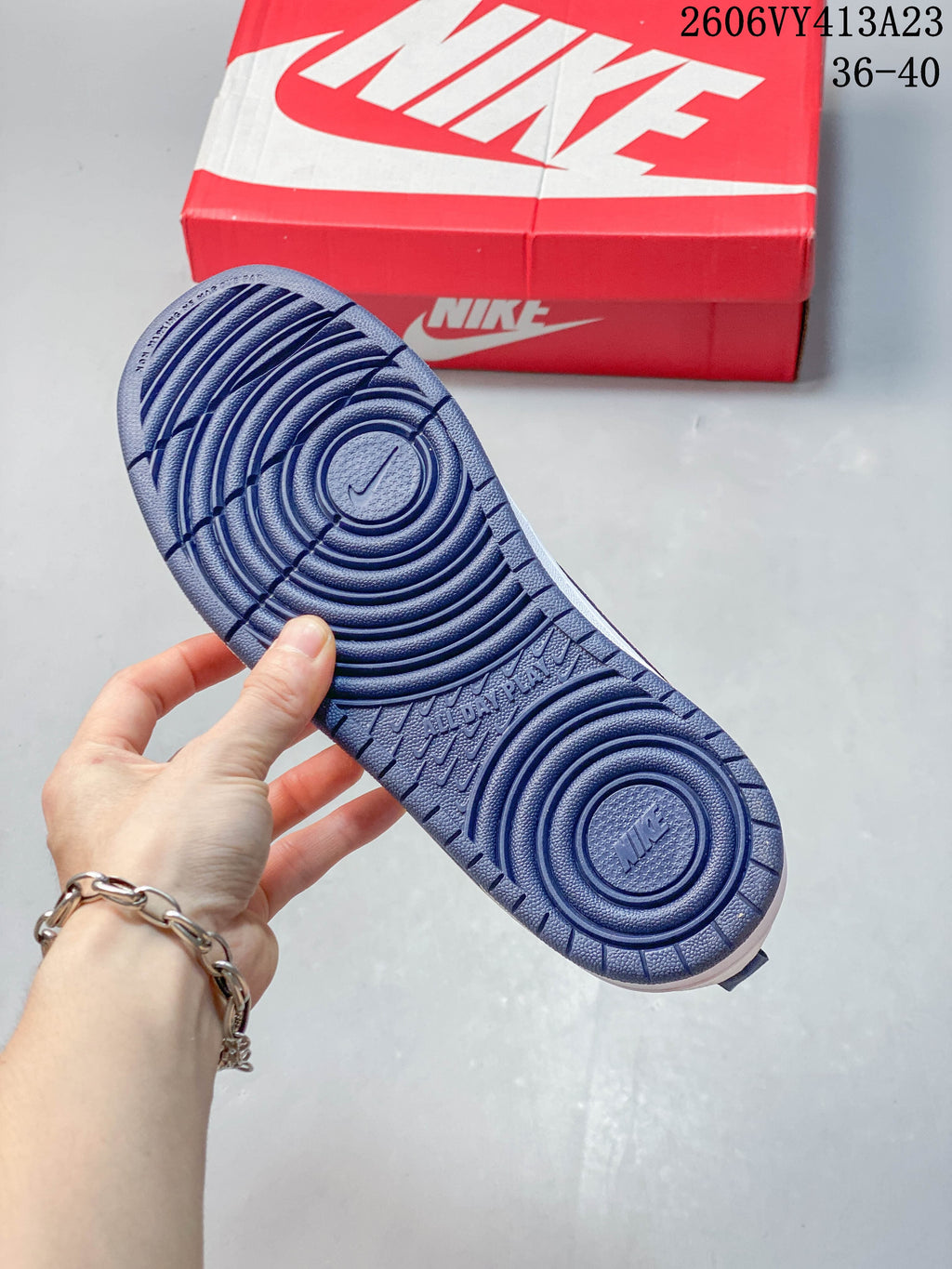 Close-up of the navy patterned outsole on a NikeCourt Borough 2 Low sneaker
