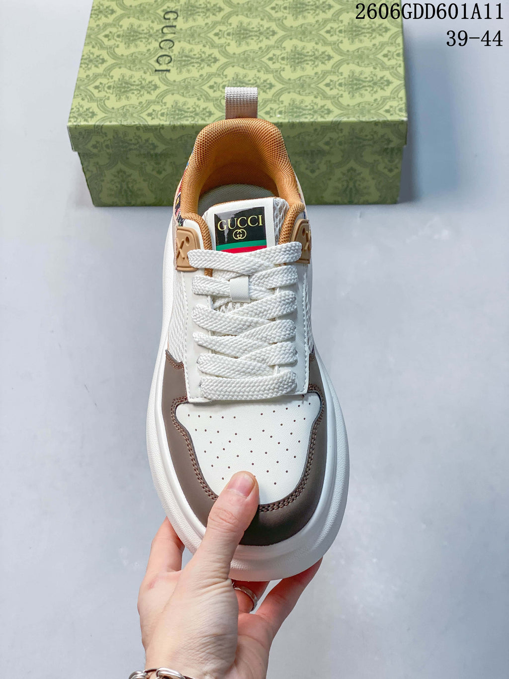 Front view showing laces and perforated toe panel