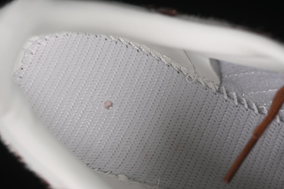 Close-up view inside the sneaker showing the footbed and lining