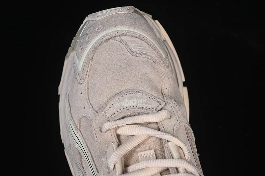 Top-down close-up of the sneaker toe and lacing