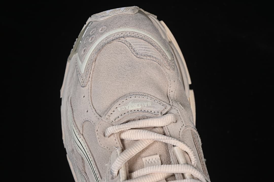 Top-down close-up of the sneaker toe and lacing