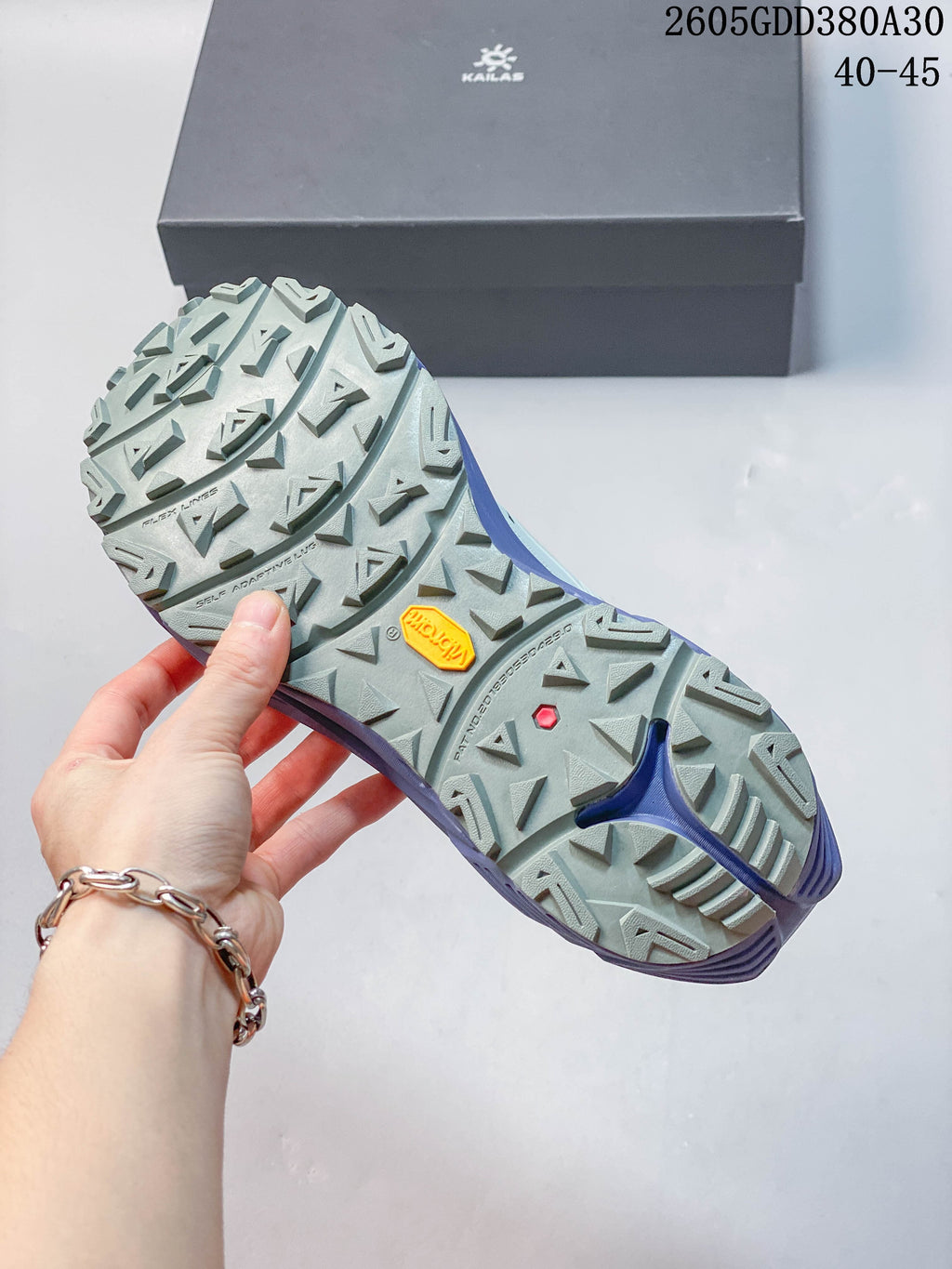 Close-up of the Kailas C4 shoe outsole showing a lugged tread and Vibram mark; image also displays the size range 40–45.
