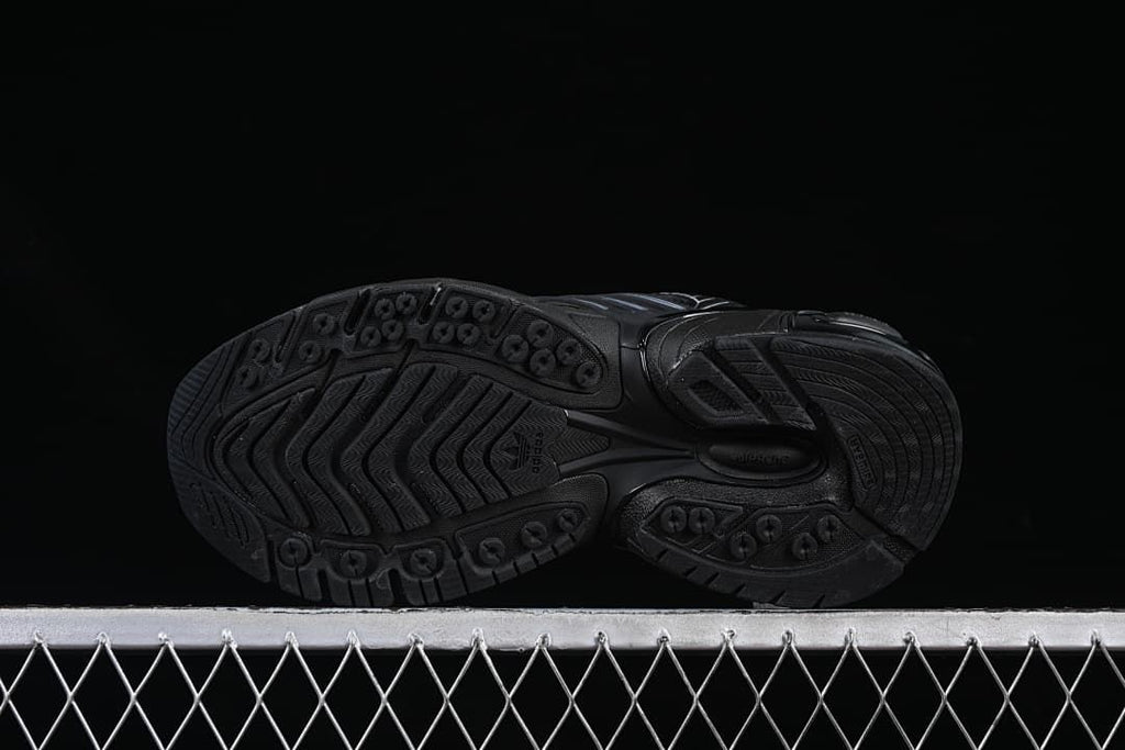 Underside view showing the patterned black outsole