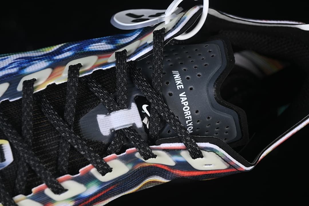 Close-up of black laces and perforated tongue marked Vaporfly
