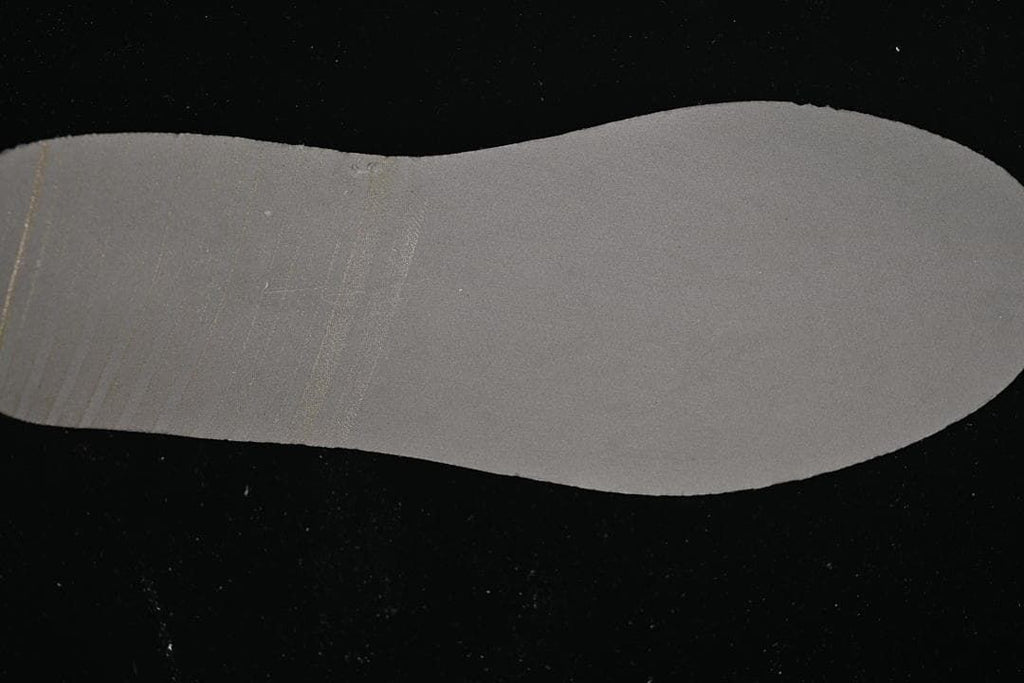 View of the shoe's gray-white footbed