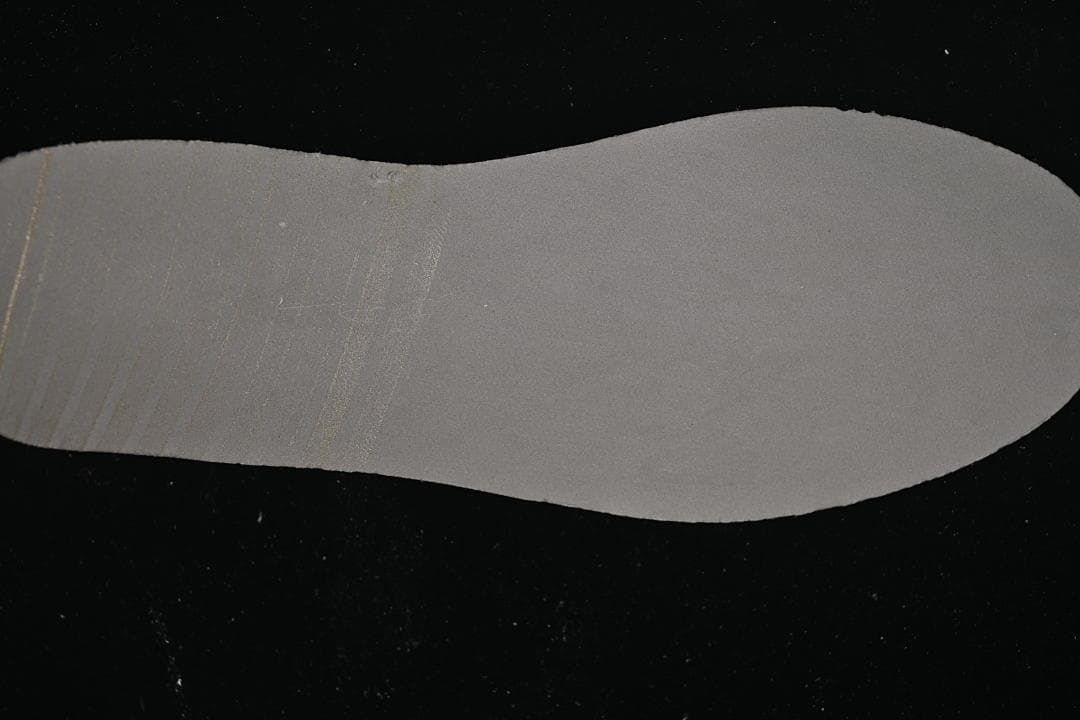 View of the shoe's gray-white footbed