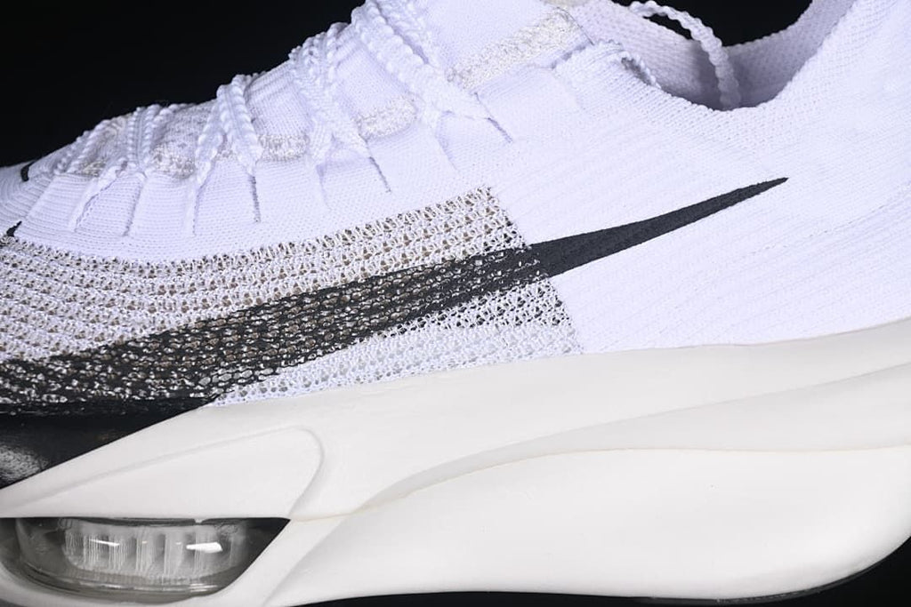 Close-up of the black Swoosh and visible forefoot cushioning element