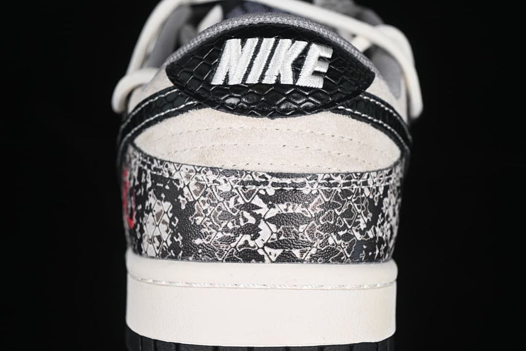 Rear view highlighting the patterned heel, black heel tab, and white midsole