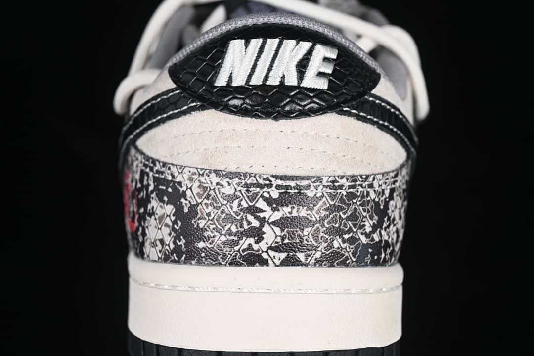 Rear view highlighting the patterned heel, black heel tab, and white midsole