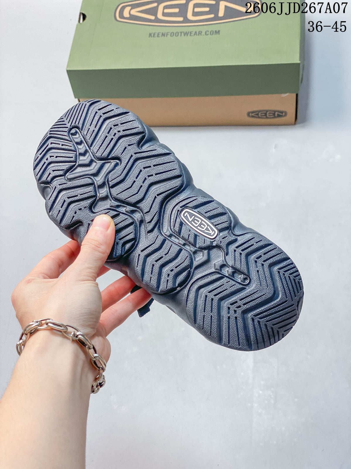 Close-up of the sandal outsole showing its sculpted tread pattern.