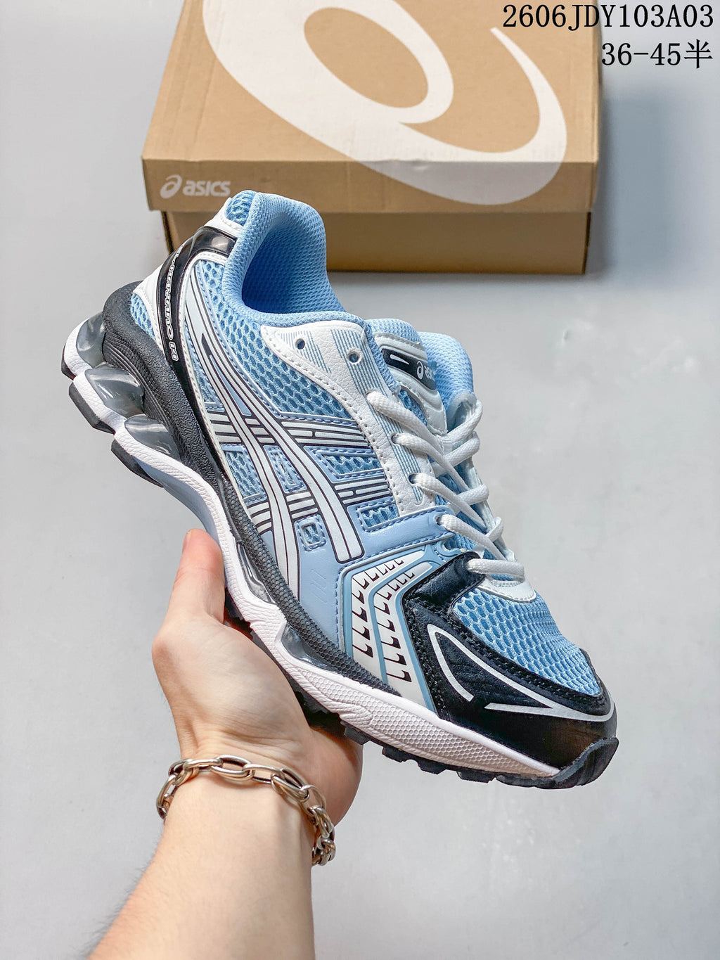 Light blue and silver ASICS GEL-KAYANO 14 sneaker
