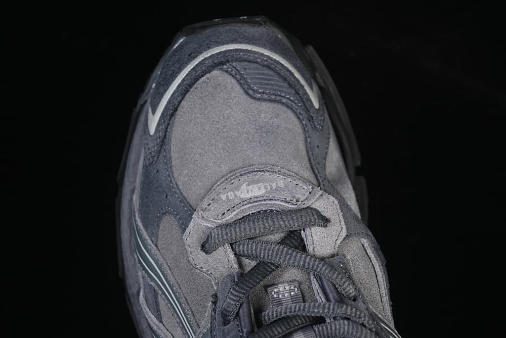 Top-down detail of the sneaker toe and lace area