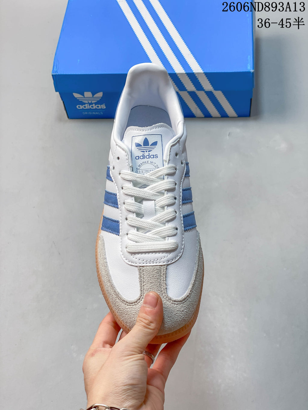 Top view of the sneaker showing its laces and suede-look toe overlay.