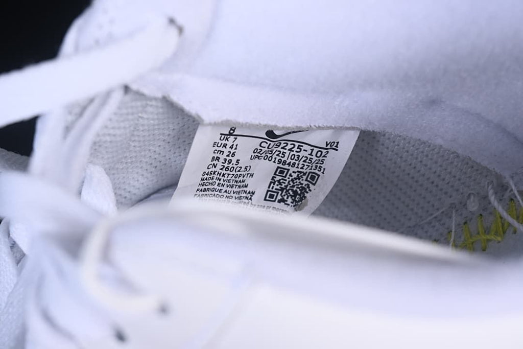 Inside shoe label showing CU9225-102 and size markings