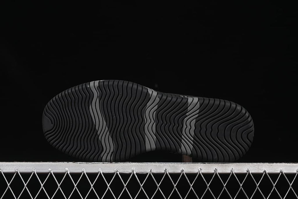 View of the grooved outsole tread