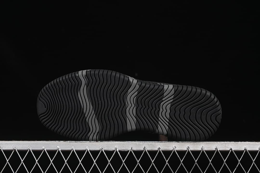 View of the grooved outsole tread