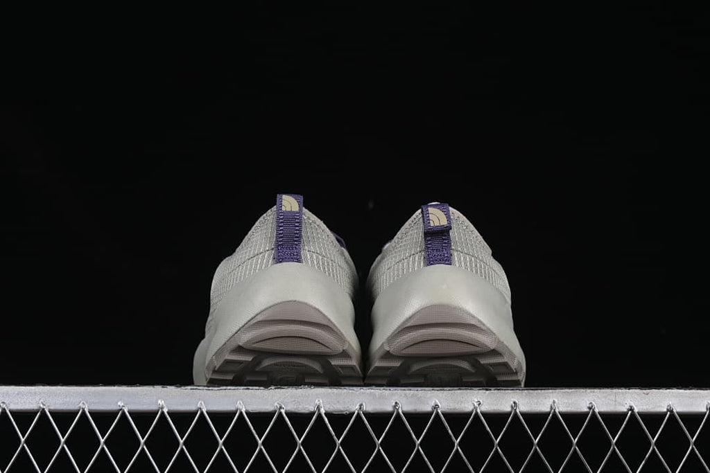 Rear view showing heel tabs and soles.