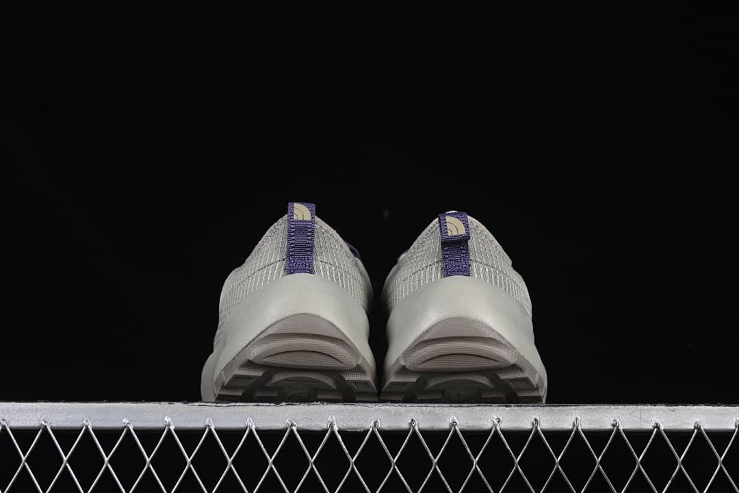 Rear view showing heel tabs and soles.