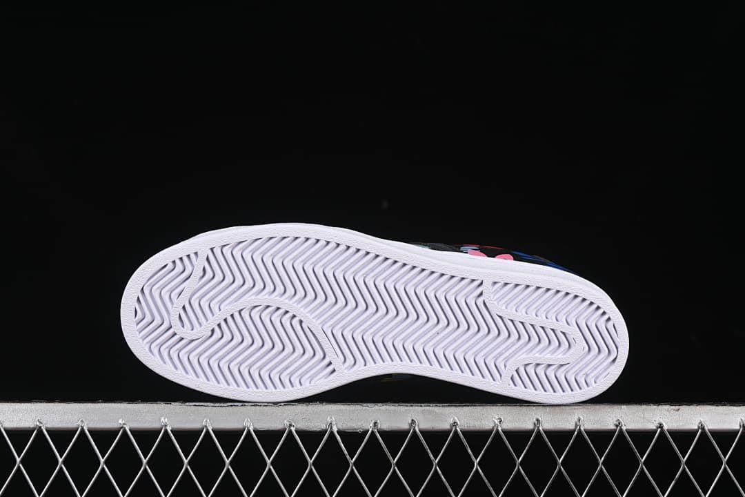 Underside view showing the patterned white outsole