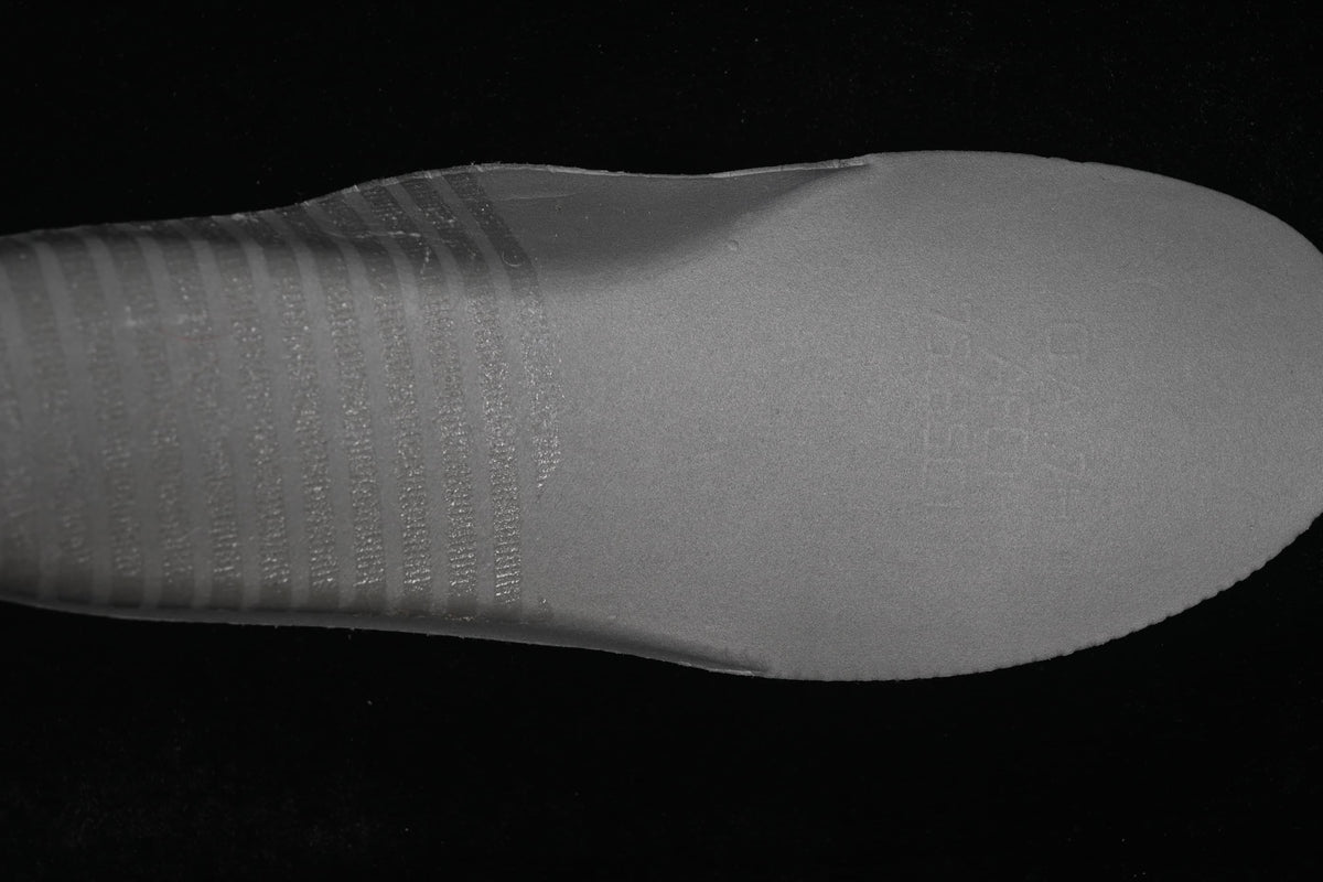 View of the sneaker's light-colored insole