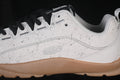 Close-up of the speckled Grayish White KEEN Jasper side panel, black laces, and gum-colored outsole.