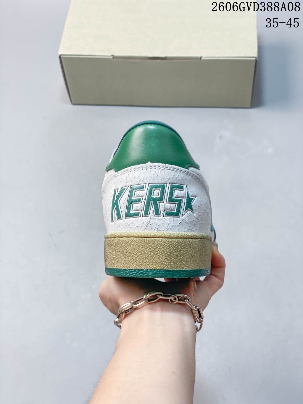 Rear view showing the green heel tab and branded heel detail