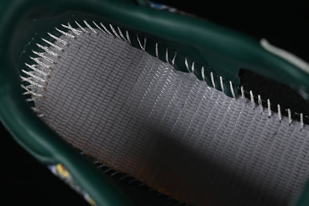 Close-up view inside the sneaker showing stitching and lining.