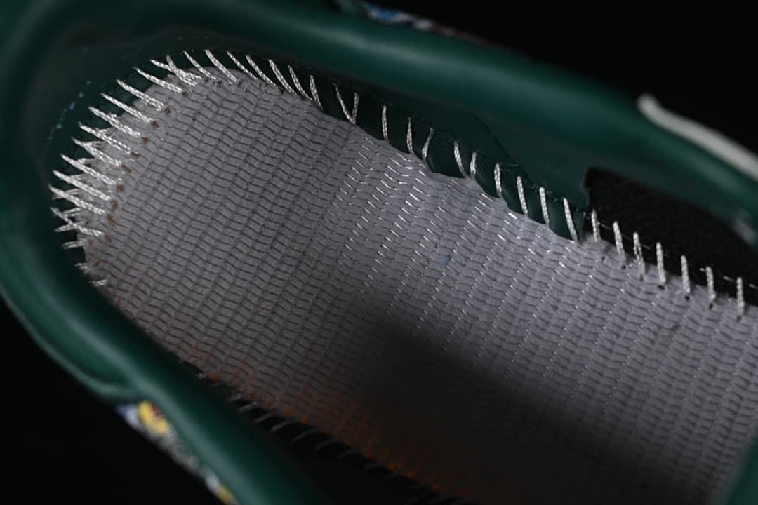 Close-up view inside the sneaker showing stitching and lining.