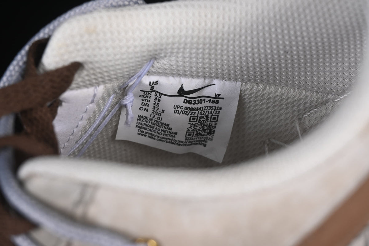 Inside shoe size label showing EU 39 and style code DB3301-188