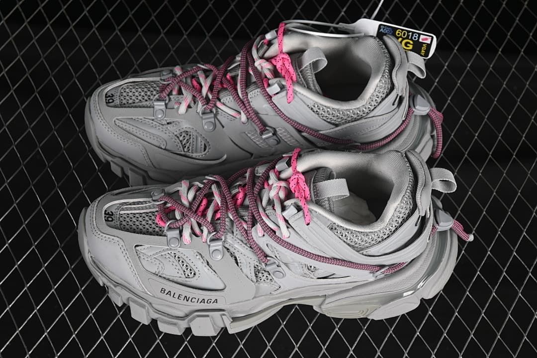 Pair of grey Track sneakers viewed from above