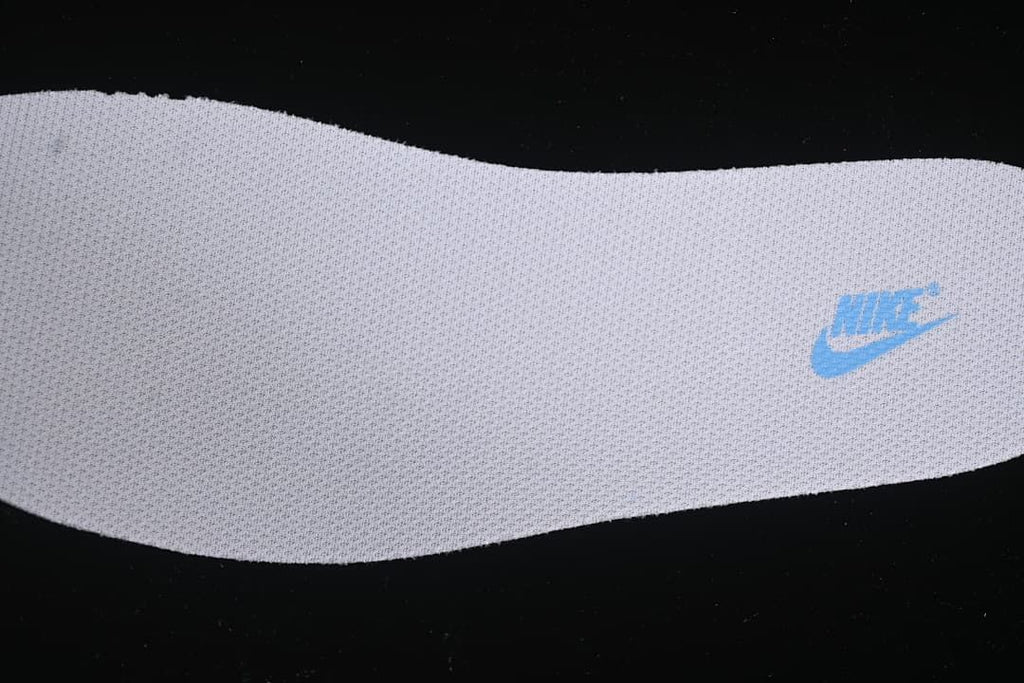 Close-up of the textured insole with blue Nike branding