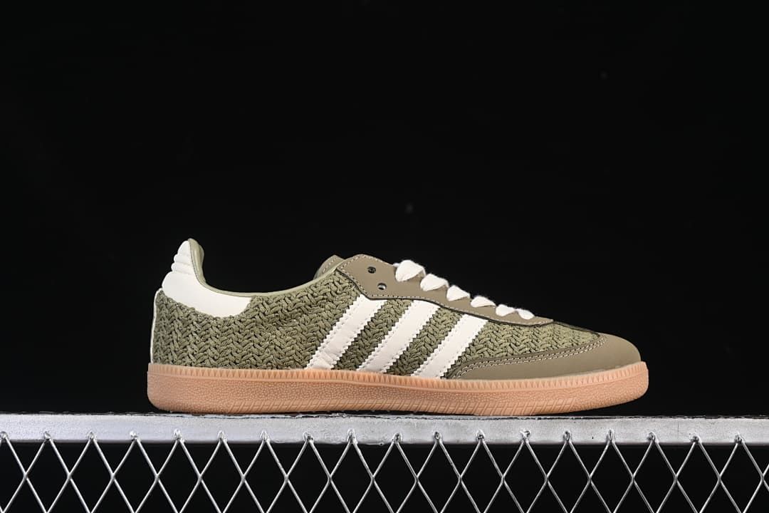Side profile of the olive-green and white low-top sneaker