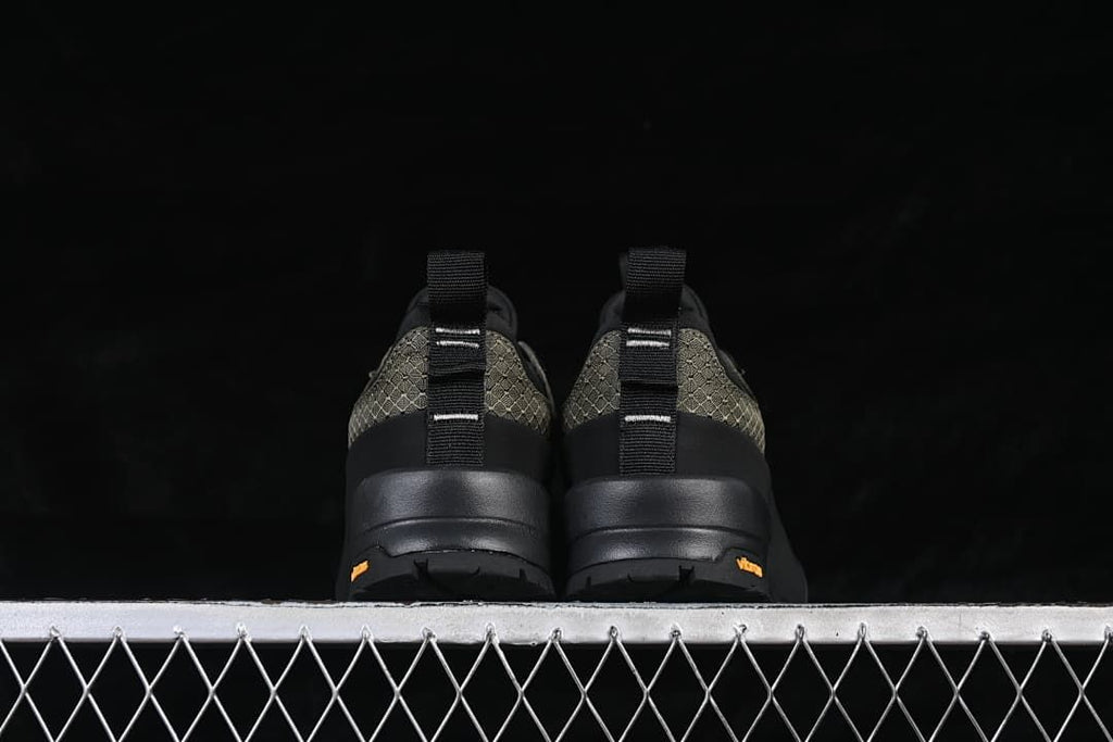 Rear view of the pair showing heel pull tabs and outsole details