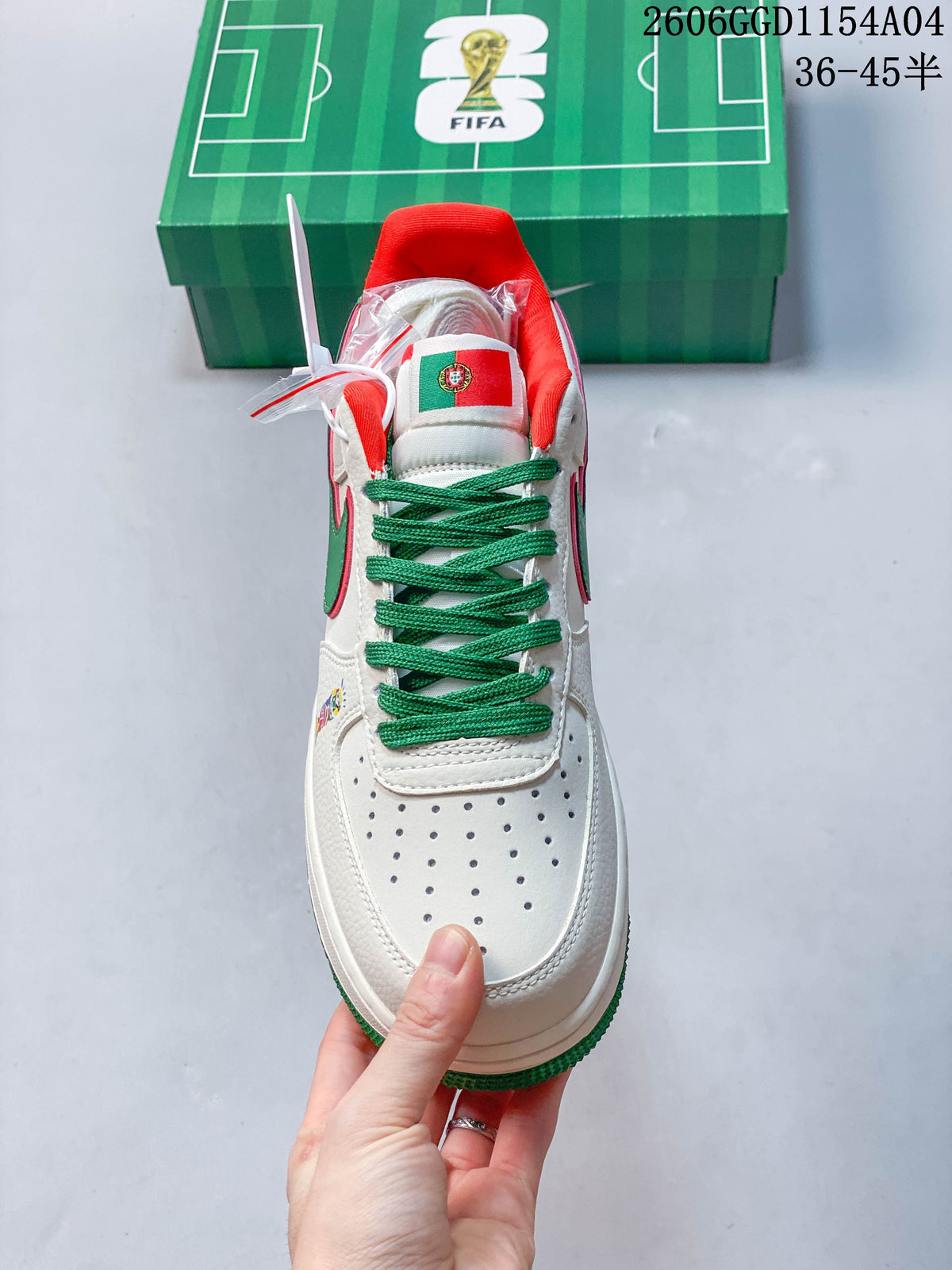 Top view showing the perforated toe, green laces, and red collar lining