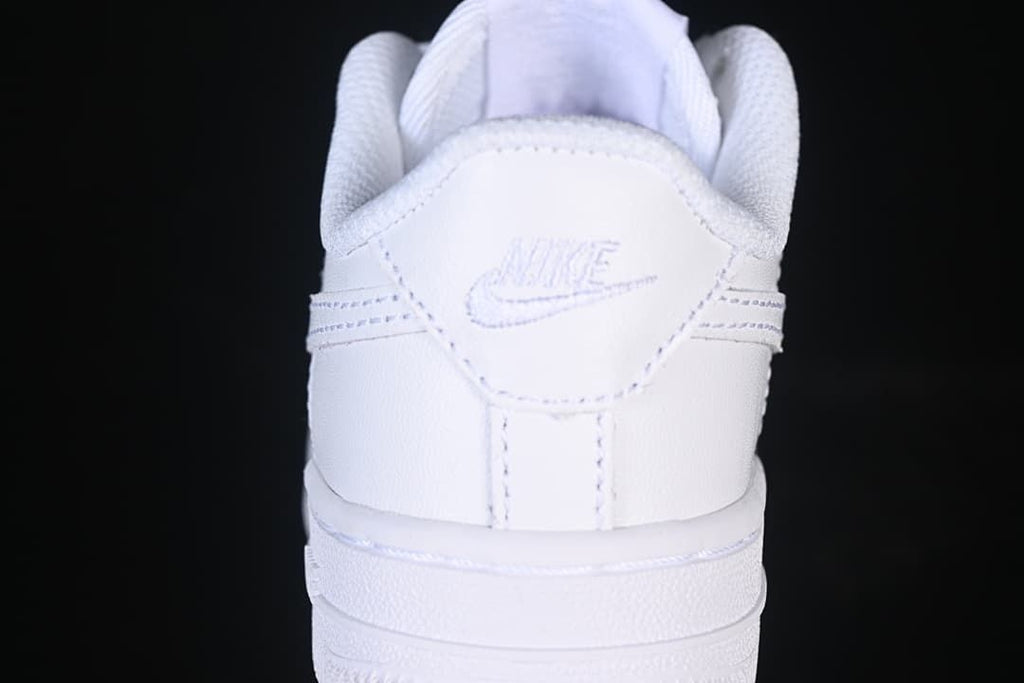 Rear view of the white sneaker with stitched branding