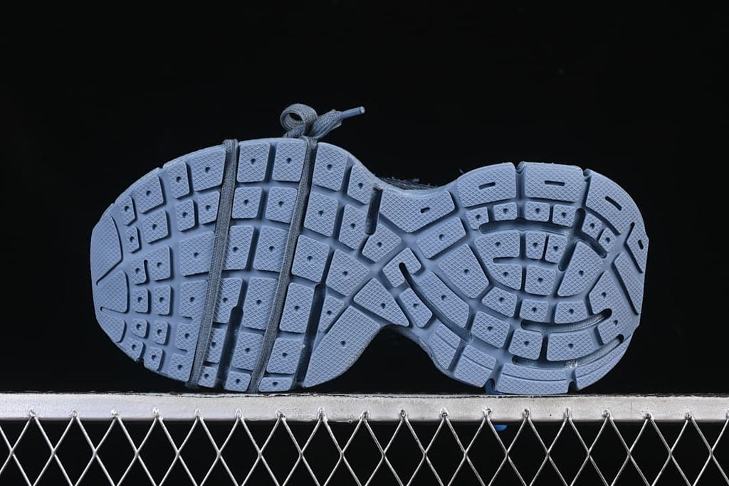 Underside view showing the segmented tread pattern