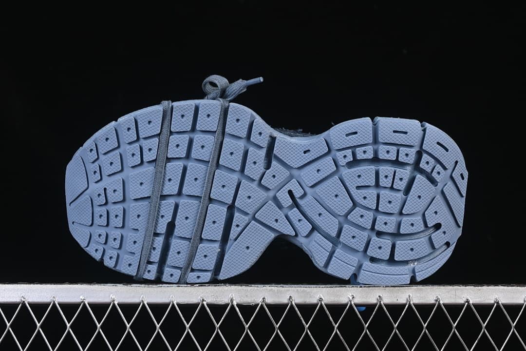 Underside view showing the segmented tread pattern