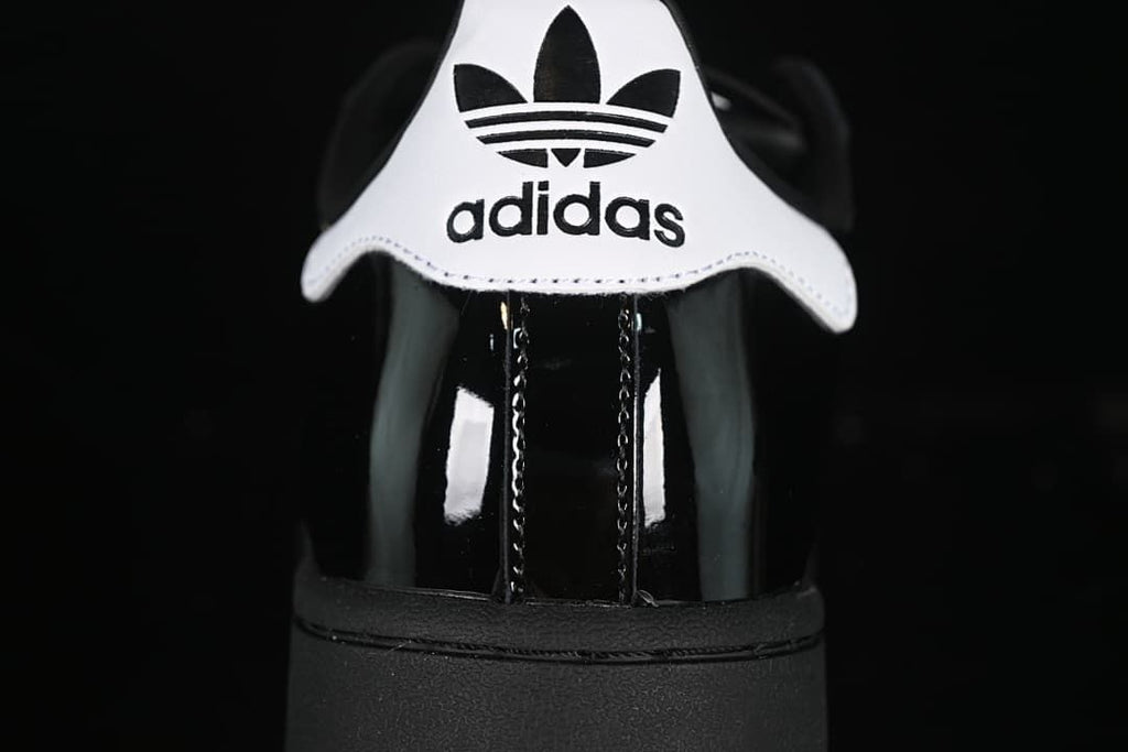 Close-up of the white Adidas-branded heel tab