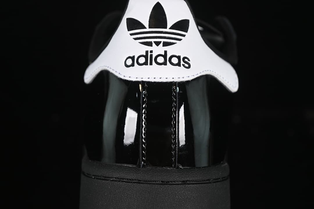 Close-up of the white Adidas-branded heel tab
