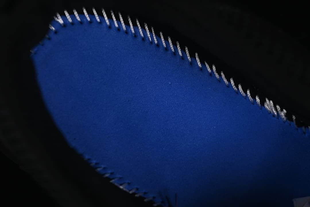 Close-up of the blue sample insert and stitching